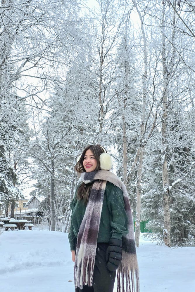 An Avian client among snow-covered trees