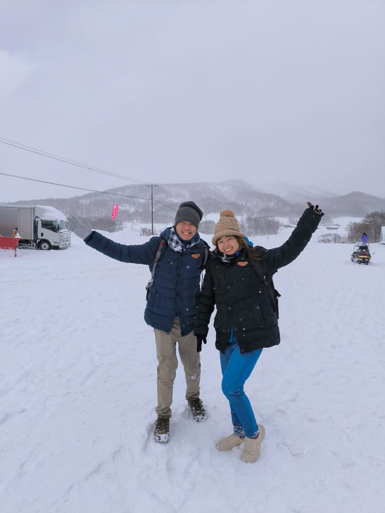 An Avian couple celebrating in the snow